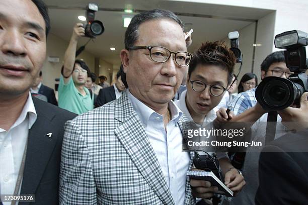 Yoon Young-Doo, President of the Asiana Airlines after his media briefing at their headquarters on July 7, 2013 in Seoul, South Korea. Two people are...