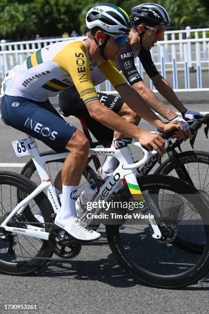 Lucas Plapp of Australia and Team INEOS Grenadiers and George Bennett of New Zealand and UAE Team Emirates compete during the 4th Gree-Tour of...