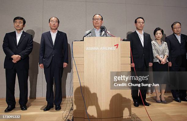Yoon Young-Doo, President of the Asiana Airlines attends a media briefing at their headquarters on July 7, 2013 in Seoul, South Korea. Two people are...
