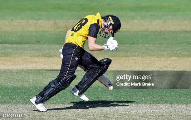 Chloe Piparo captain of Western Australia celebrates bringing up her century during the WNCL match between South Australia and Western Australia at...