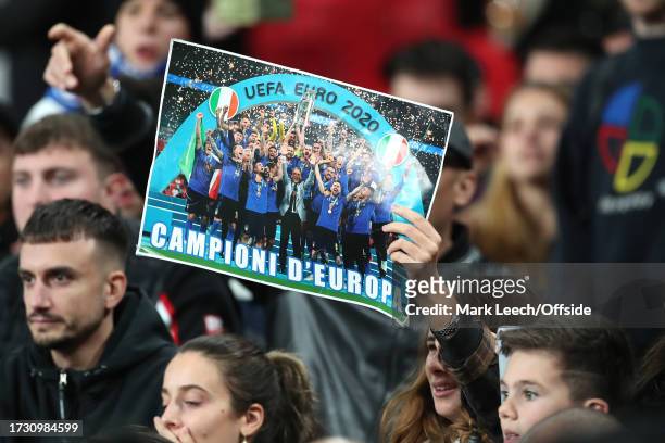 An Italian supporter taunts the English with a photo of Italy winning the Euro final in 2021 during the UEFA EURO 2024 European qualifier match...