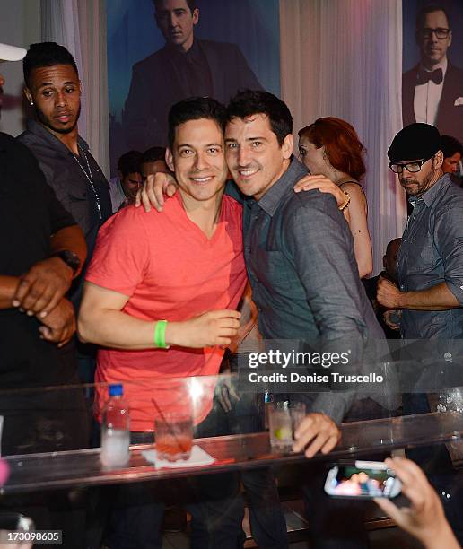 Alex Acuna and Jonathan Knight attend Pure Nightclub at Caesars Palace on July 6, 2013 in Las Vegas, Nevada.