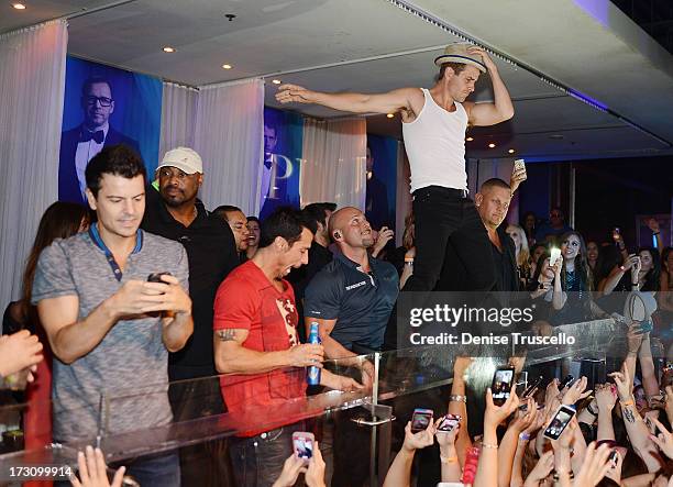 Jordan Knight, Danny Wood and Joey McIntyre of New Kids On The Block host at Pure Nightclub at Caesars Palace on July 6, 2013 in Las Vegas, Nevada.