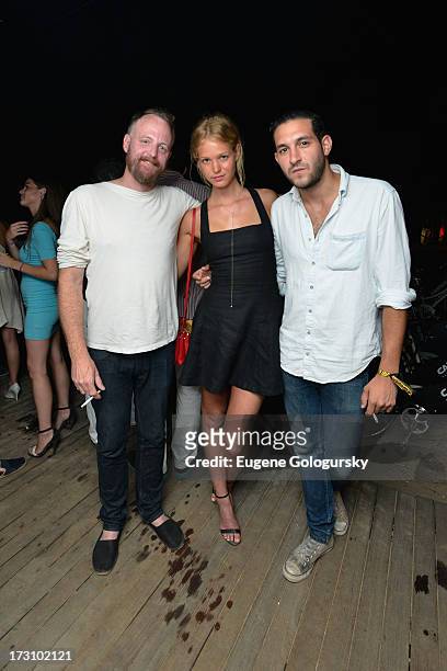 Musician Pat Mahoney, model Erin Heatherton, and musician Alex Frankel at The Surf Lodges Summer DJ Series to launch the new Samsung Giga speaker...