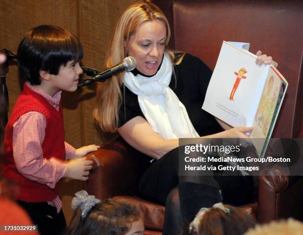 Boston, MA -FM radio 121611 personality Sue Brady entertained children attending The Teddy Bear Tea at The Four Seasons by reading The Elf On The...