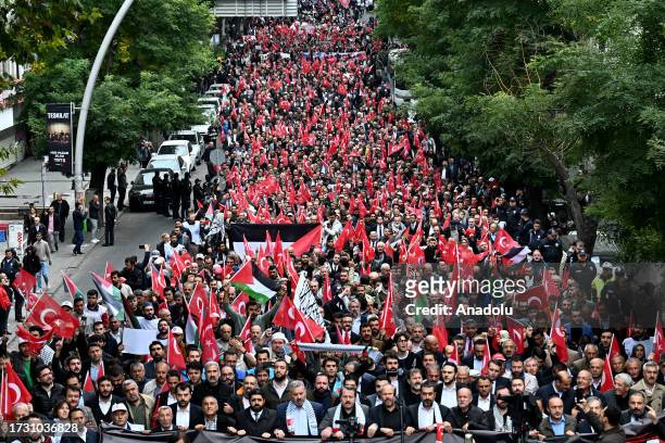 People carrying Turkish and Palestinian flags, gather to attend a demonstration led by Ankara Civil Society Platform at Abdi Ipekci Park after...