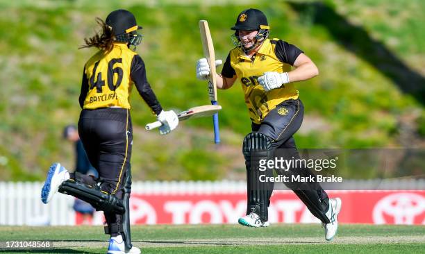 Zoe Britcliffe of Western Australia and Chloe Ainsworth of Western Australia celebrate the winning run during the WNCL match between South Australia...