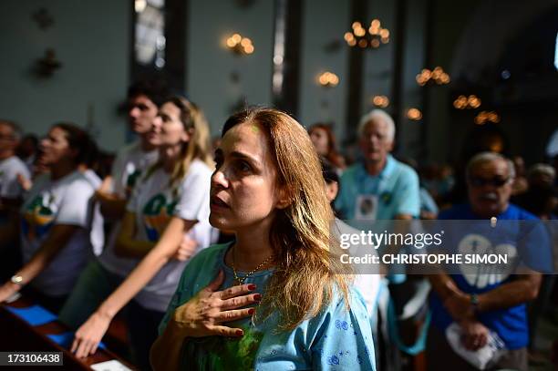 Faithful attend the mass officiated by Cardinal Stanislaw Rylko to celebrate the arrival in Brazil of the relics of blessed John Paul II at the...