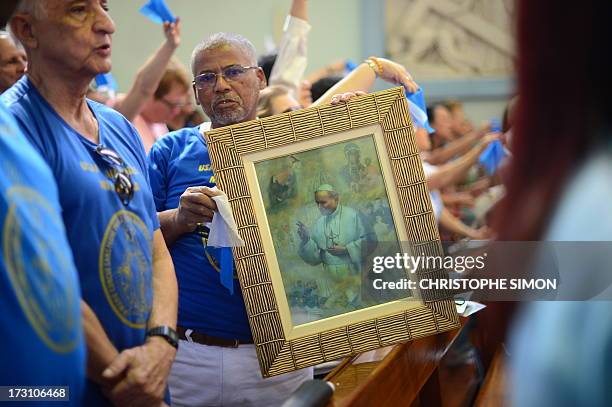 Faithful attend the mass officiated by Cardinal Stanislaw Rylko to celebrate the arrival in Brazil of the relics of blessed John Paul II at the...