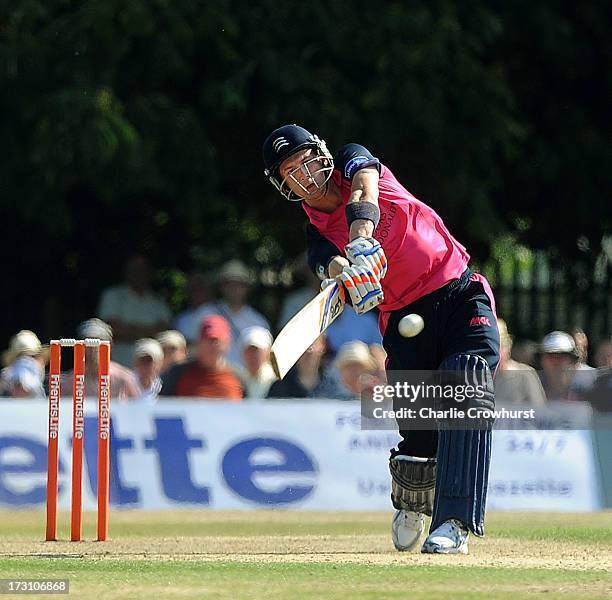 Joseph Denly of Middlesex hits a four during the Friends Life T20 match between Middlesex Panthers and Kent Spitfires at Uxbridge Cricket Club on...