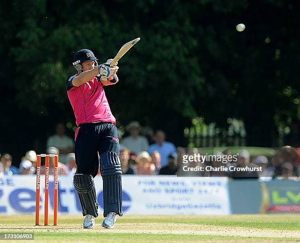 Joseph Denly of Middlesex slogs the ball during the Friends Life T20 match between Middlesex Panthers and Kent Spitfires at Uxbridge Cricket Club on...