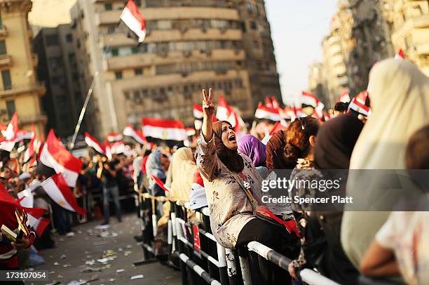 People attend a large rally in Tahrir Square against ousted Egyptian President Mohamed Morsi on July 7, 2013 in Cairo, Egypt. Egypt continues to be...