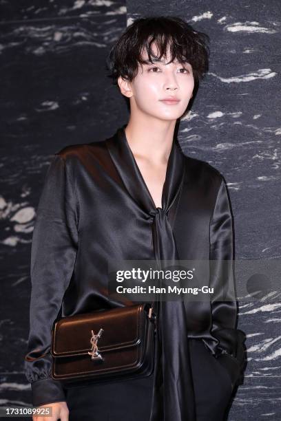 JeongHan of boy band Seventeen is seen at the 'Saint Laurent' mens store opening on October 12, 2023 in Seoul, South Korea.