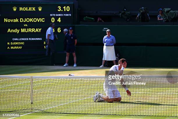 Andy Murray of Great Britain celebrates Championship point during the Gentlemen's Singles Final match against Novak Djokovic of Serbia on day...