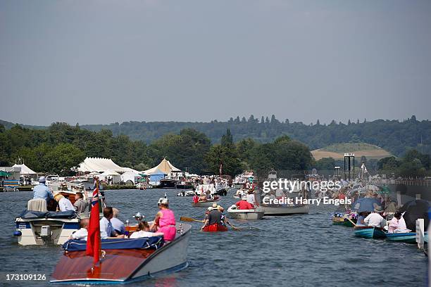 General view of the river as spectators watch the racing from boats on day four of the Henley Royal Regatta on July 6, 2013 in Henley-on-Thames,...