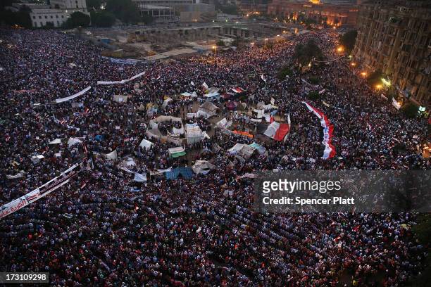 Tens of thousands of people attend a rally in Tahrir Square against ousted Egyptian President Mohamed Morsi on July 7, 2013 in Cairo, Egypt. Egypt...
