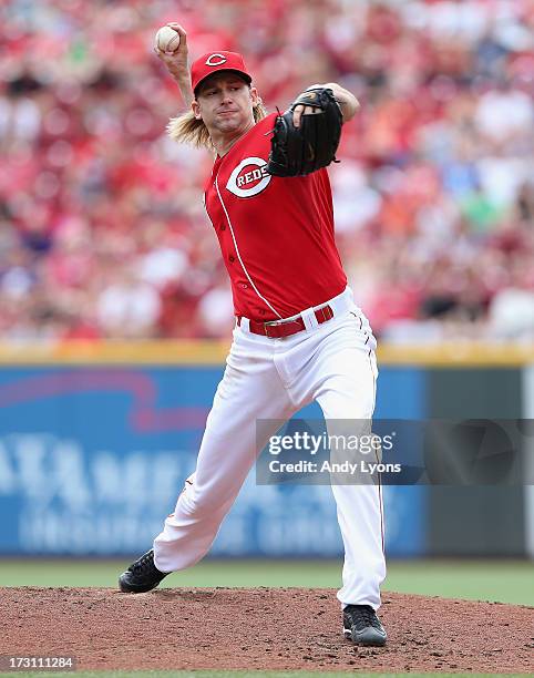 Bronson Arroyo of the Cincinnati Reds throws a pitch during the game against the Seattle Mariners at Great American Ball Park on July 7, 2013 in...