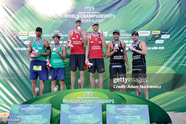 Silver medallists Ricardo Alex Costa Santos and Alvaro Morais Filho of Brazil with gold medallists, Alexander Brouwer and Robert Meeuwsen of the...