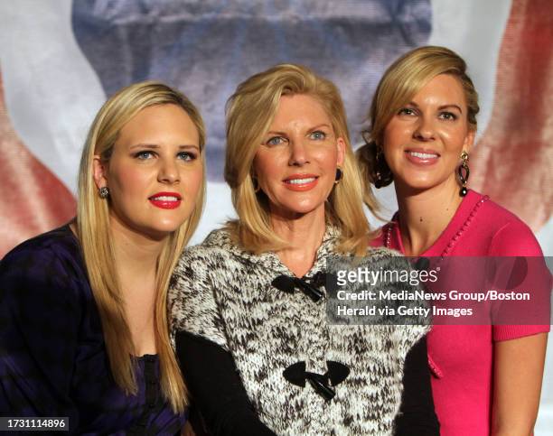 Presidential hopeful Jon Huntsman's wife Mary Kaye, center, and daughters Liddy, left, and Mary Anne, right, pose for photos after a forum in UMass...