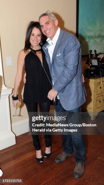 Amanda Zacharia and Robert Korff of Newton attend Wes Welker's charity event at the home of Andy Spellman on Monday, December 19, 2011. Staff photo...