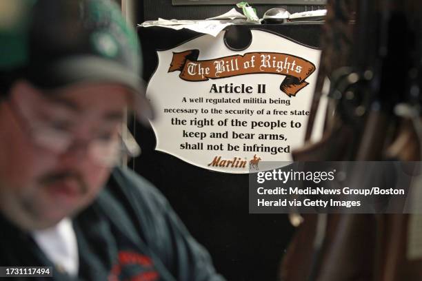 Middleboro, MA 121912 A sign is posted with an excerpt of the Second Amendment on a gun safe at C & F Guns. Wednesday, December 19, 2012. Staff Photo...