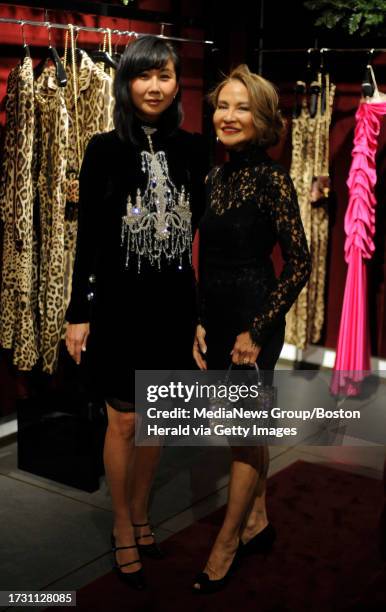 Sue Ha, left, of Boston and Madeleine Capino of Lexington attend the Dolce & Gabbana and Friends of the MFA Fashion Council holiday season...