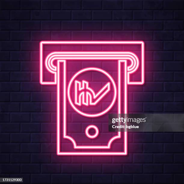 indian rupee withdrawal. glowing neon icon on brick wall background - rupee note stock illustrations