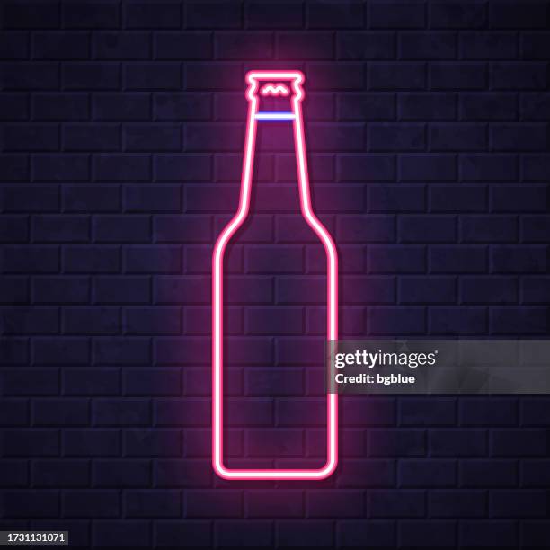 beer bottle. glowing neon icon on brick wall background - apple cider stock illustrations