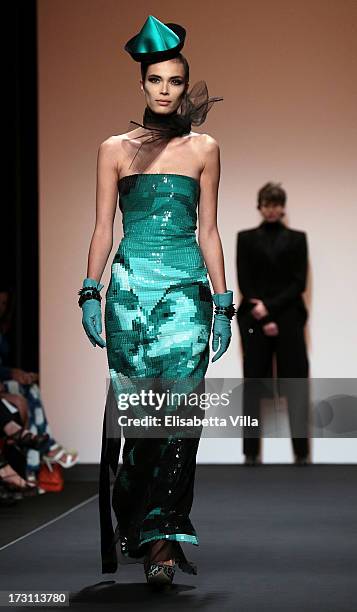 Model walks the runway during Jean Paul Gaultier Houte Couture Paris fashion show as part of AltaRoma AltaModa Fashion Week at Santo Spirito in...