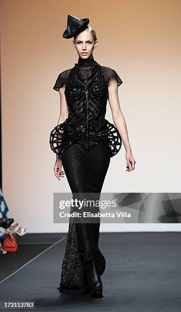 Model walks the runway during Jean Paul Gaultier Houte Couture Paris fashion show as part of AltaRoma AltaModa Fashion Week at Santo Spirito in...