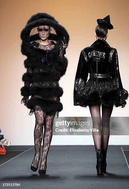 Models walk the runway during Jean Paul Gaultier Houte Couture Paris fashion show as part of AltaRoma AltaModa Fashion Week at Santo Spirito in...