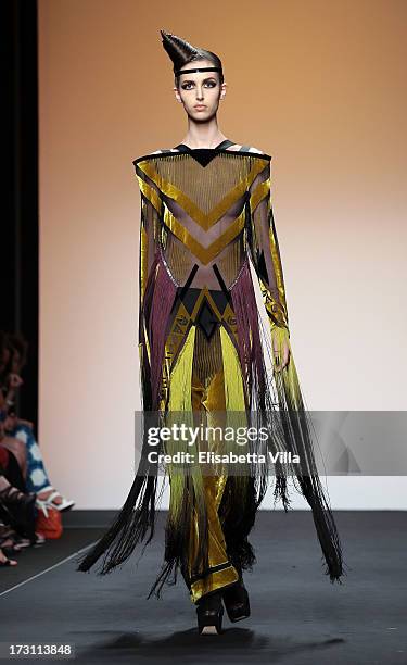 Model walks the runway during Jean Paul Gaultier Houte Couture Paris fashion show as part of AltaRoma AltaModa Fashion Week at Santo Spirito in...