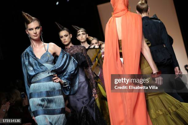 Models walk the runway during Jean Paul Gaultier Houte Couture Paris fashion show as part of AltaRoma AltaModa Fashion Week at Santo Spirito in...