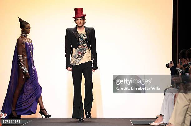Models walk the runway during Jean Paul Gaultier Houte Couture Paris fashion show as part of AltaRoma AltaModa Fashion Week at Santo Spirito in...