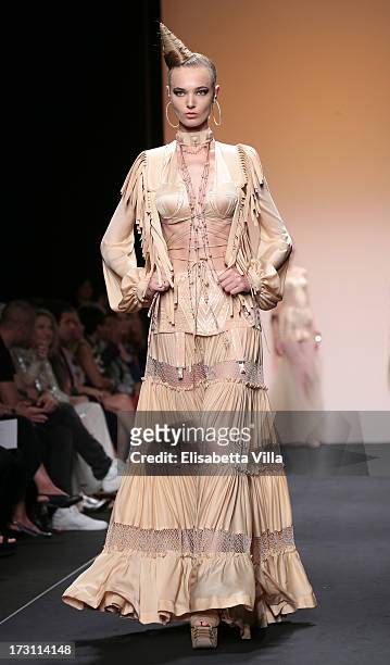 Model walks the runway during Jean Paul Gaultier Houte Couture Paris fashion show as part of AltaRoma AltaModa Fashion Week at Santo Spirito in...