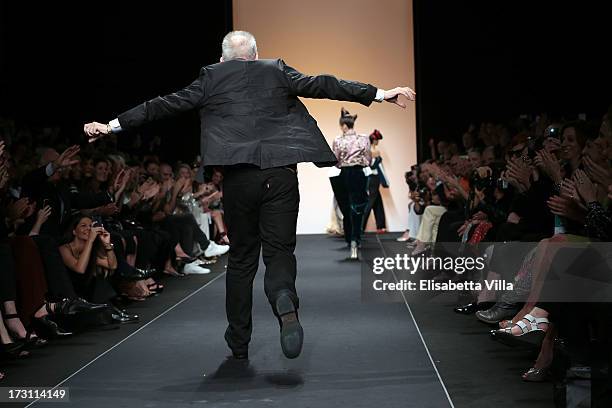 Designer Jean Paul Gaultier runs the runway during his Houte Couture Paris fashion show as part of AltaRoma AltaModa Fashion Week at Santo Spirito in...