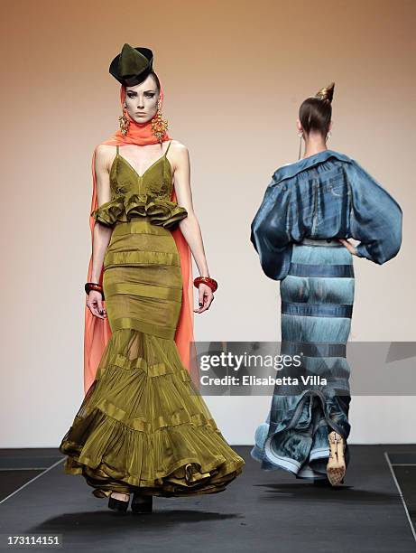 Models walk the runway during Jean Paul Gaultier Houte Couture Paris fashion show as part of AltaRoma AltaModa Fashion Week at Santo Spirito in...