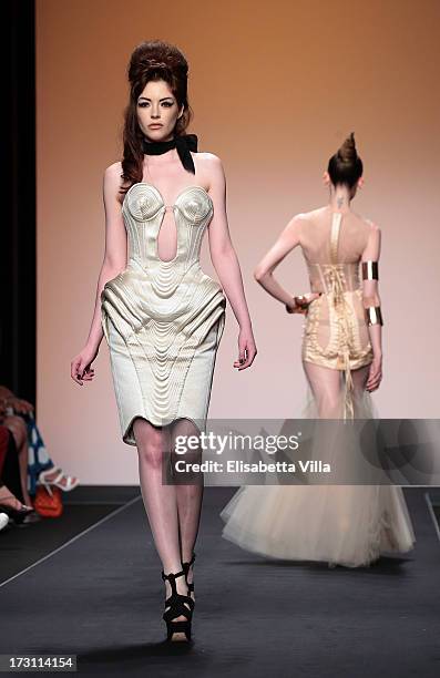 Model walks the runway during Jean Paul Gaultier Houte Couture Paris fashion show as part of AltaRoma AltaModa Fashion Week at Santo Spirito in...