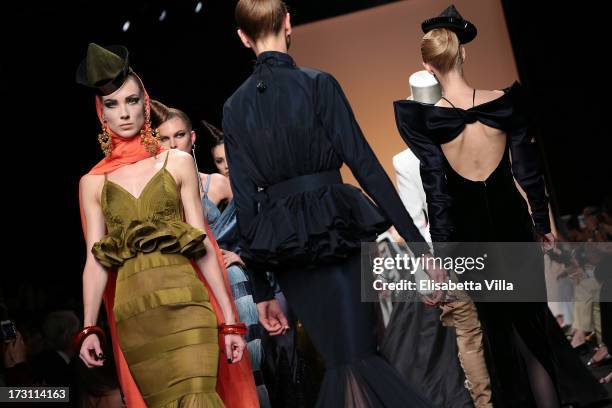 Models walk the runway during Jean Paul Gaultier Houte Couture Paris fashion show as part of AltaRoma AltaModa Fashion Week at Santo Spirito in...