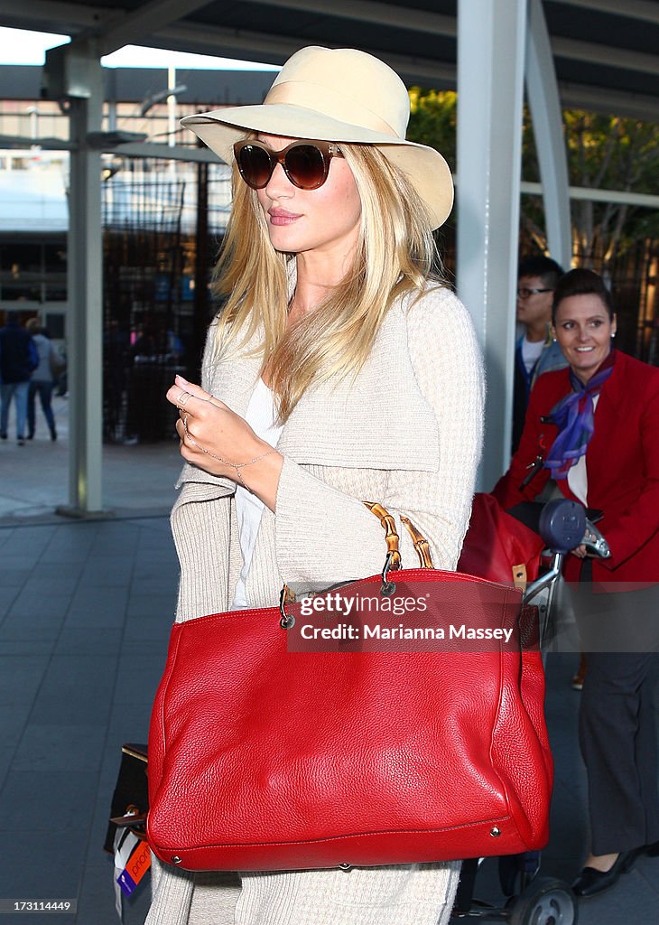 Rosie Huntington-Whiteley Arrives In Australia