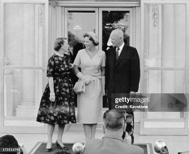 Princess Beatrix of the Netherlands , with US President Dwight D Eisenhower and First Lady Mamie Eisenhower posing for photographers on the north...