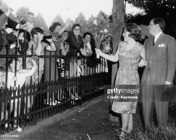 Princess Beatrix of the Netherlands and her fiancee Claus van Amsberg in the grounds of Soestdijk Palace, Utrecht, Netherlands, after they announced...