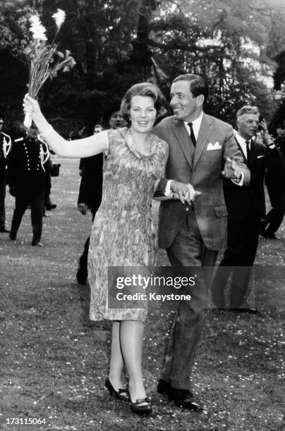 Princess Beatrix of the Netherlands and her fiancee Claus van Amsberg in the grounds of Soestdijk Palace, Utrecht, Netherlands, after they announced...