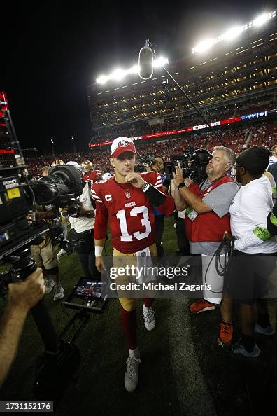 Brock Purdy of the San Francisco 49ers on the field after the game