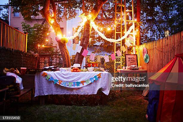 backyard birthday party in ihe city - birthday decoration stock pictures, royalty-free photos & images