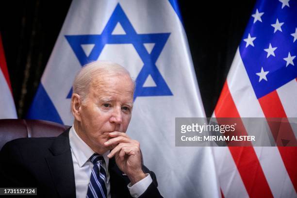 President Joe Biden joins Israel's Prime Minister for the start of the Israeli war cabinet meeting, in Tel Aviv on October 18 amid the ongoing...