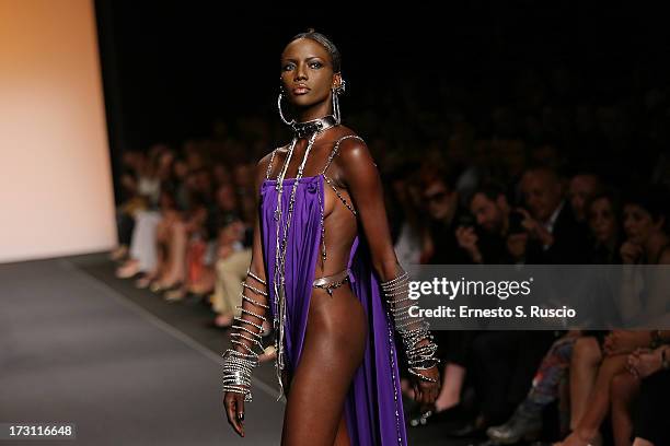 Model walks the runway during the Jean Paul Gaultier Couture fashion show as part of AltaRoma AltaModa Fashion Week Autumn/Winter 2013 on July 7,...