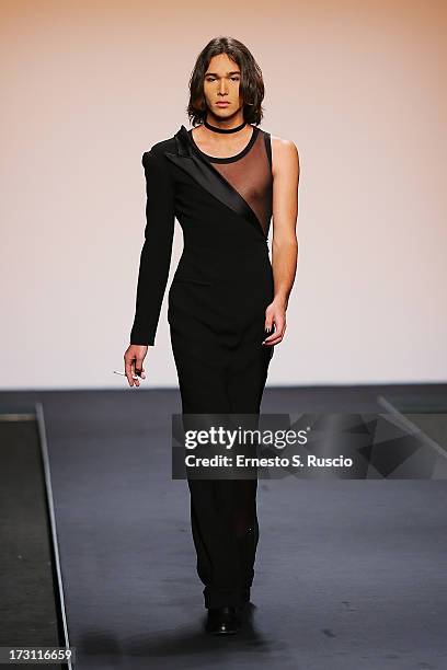 Model walks the runway during the Jean Paul Gaultier Couture fashion show as part of AltaRoma AltaModa Fashion Week Autumn/Winter 2013 on July 7,...