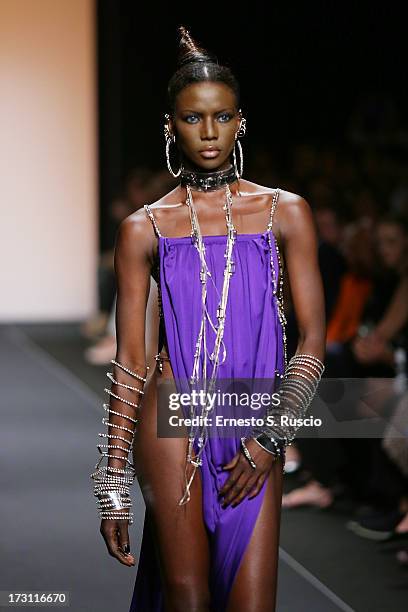 Model walks the runway during the Jean Paul Gaultier Couture fashion show as part of AltaRoma AltaModa Fashion Week Autumn/Winter 2013 on July 7,...