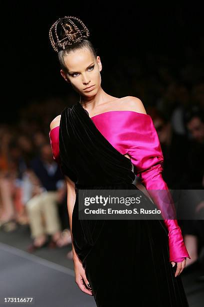 Model walks the runway during the Jean Paul Gaultier Couture fashion show as part of AltaRoma AltaModa Fashion Week Autumn/Winter 2013 on July 7,...